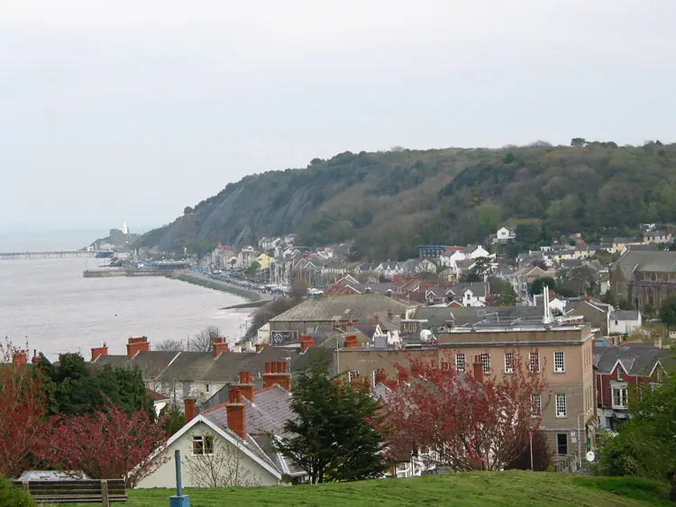 Houses on the hillside at Mumbles with the headland behind